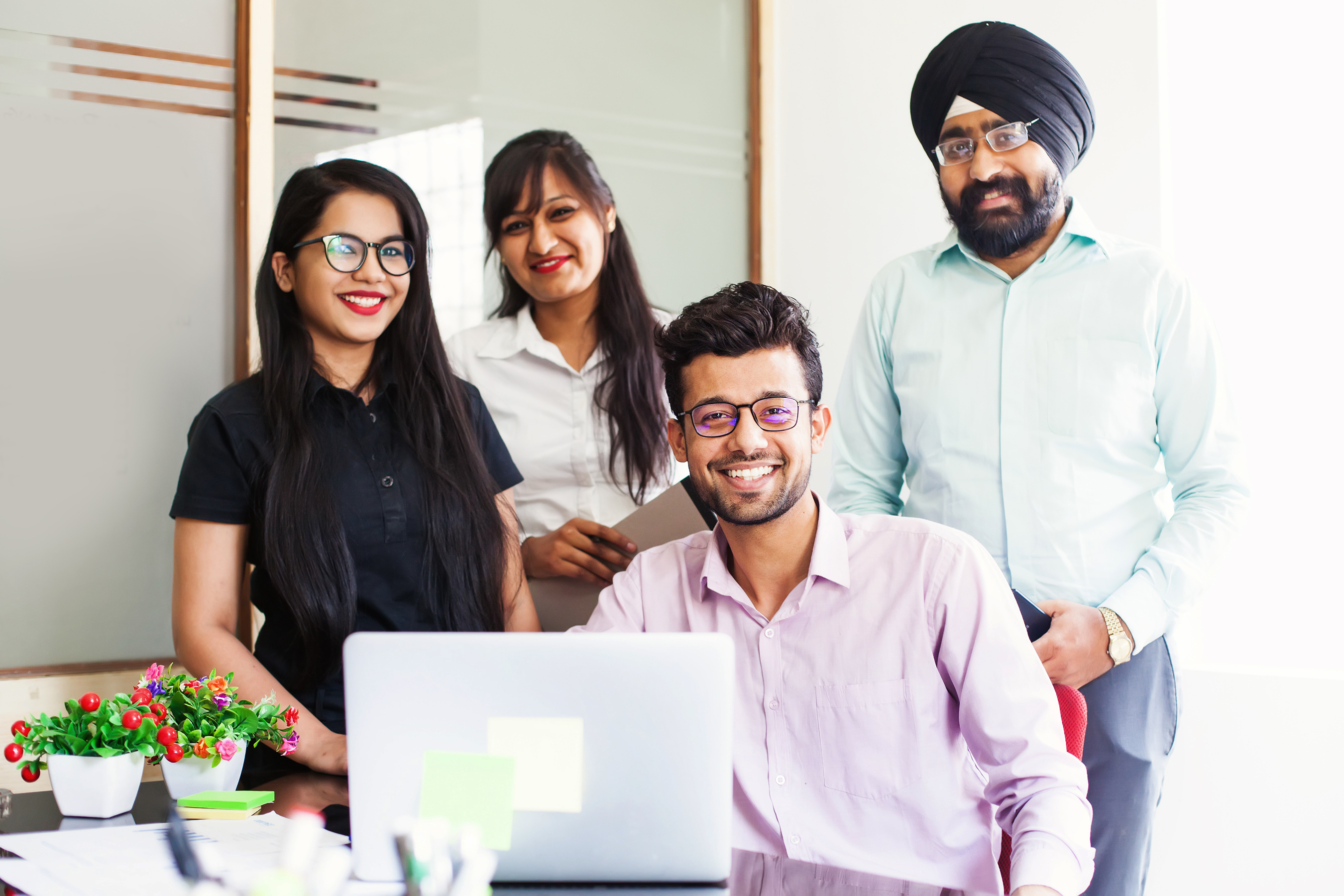 Vxceed team collaboration highlighting the culture behind Vxceed’s AI-driven SFA and DMS innovation for CPG enterprises.